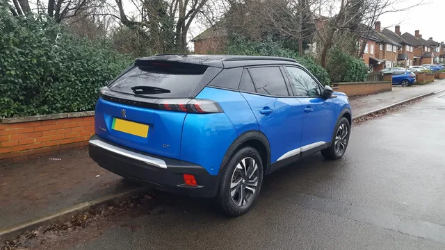 File:2022 Peugeot e-2008 GT in Vertigo Blue (Rear).png